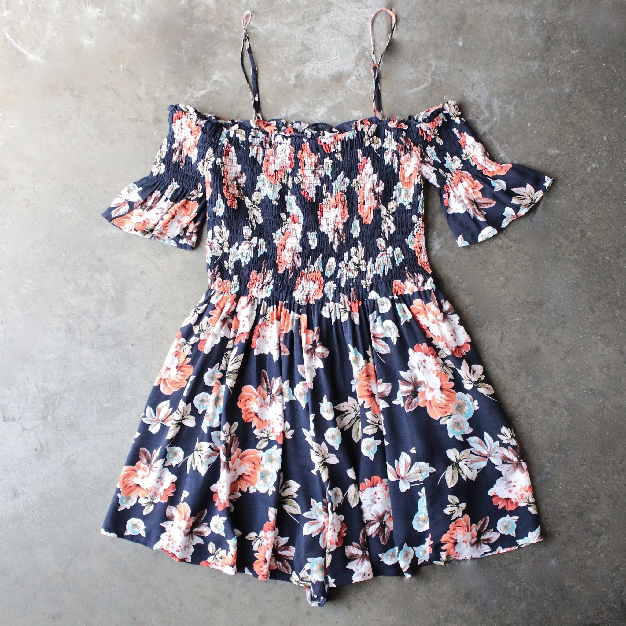 Final Sale - Smocked Cold Shoulder Romper in Navy Floral Print