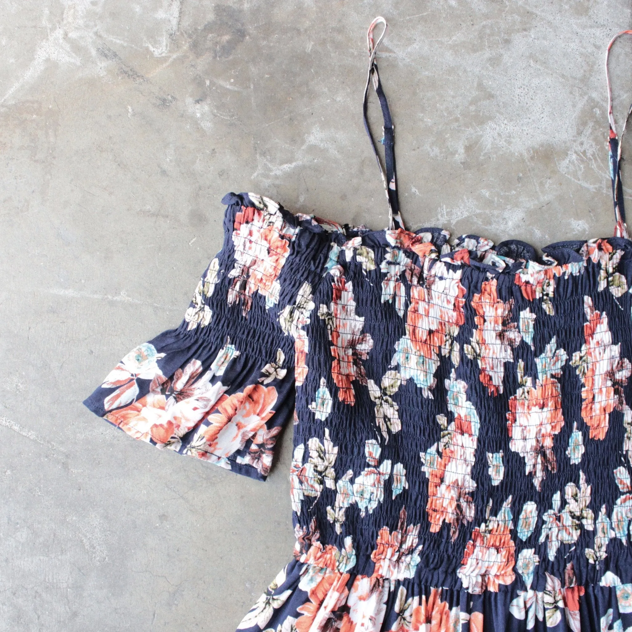 Final Sale - Smocked Cold Shoulder Romper in Navy Floral Print