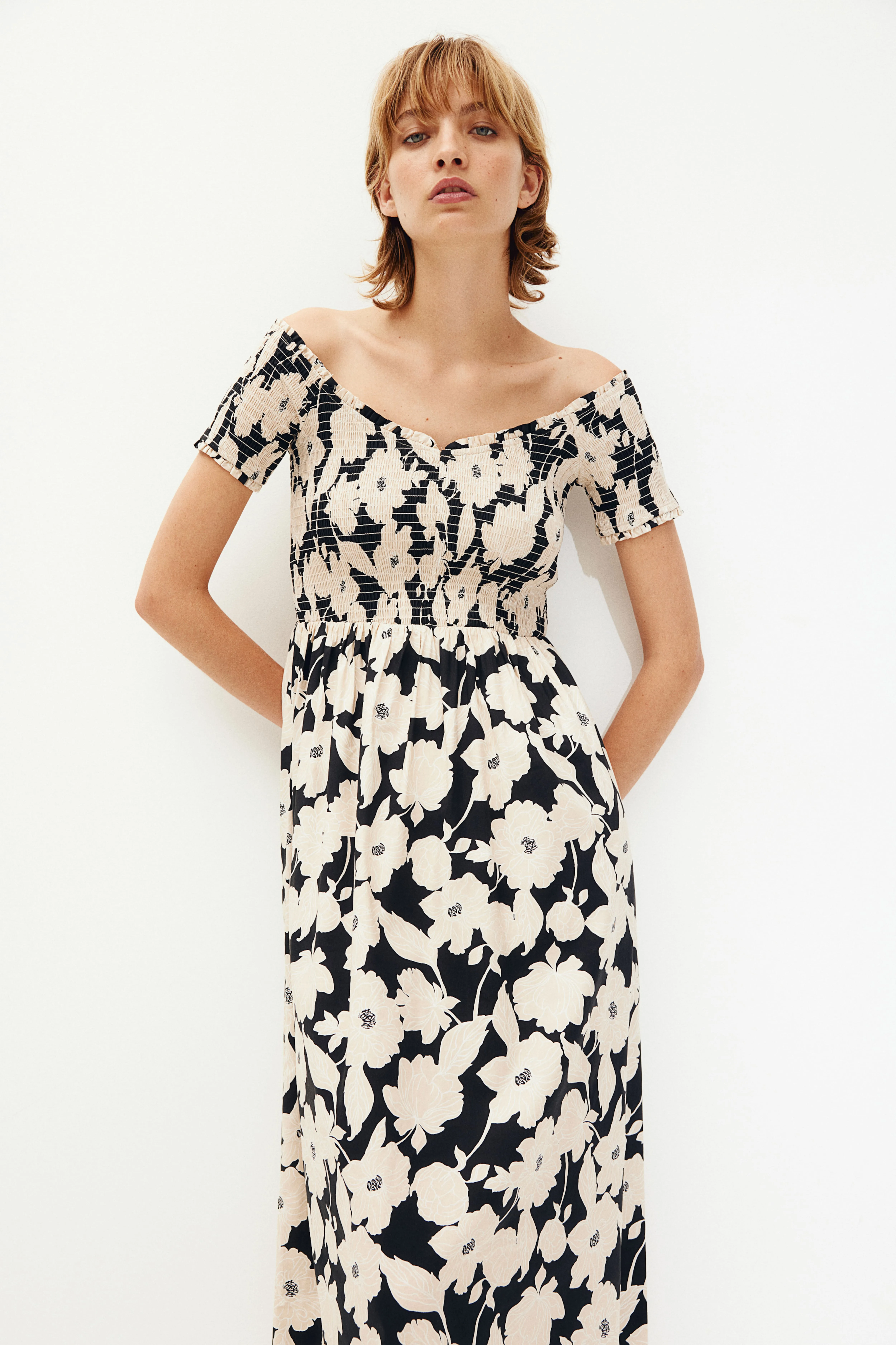 Smocked off-the-shoulder dress - V-neck - Short sleeve - Black/Beige floral - Ladies | H&M GB