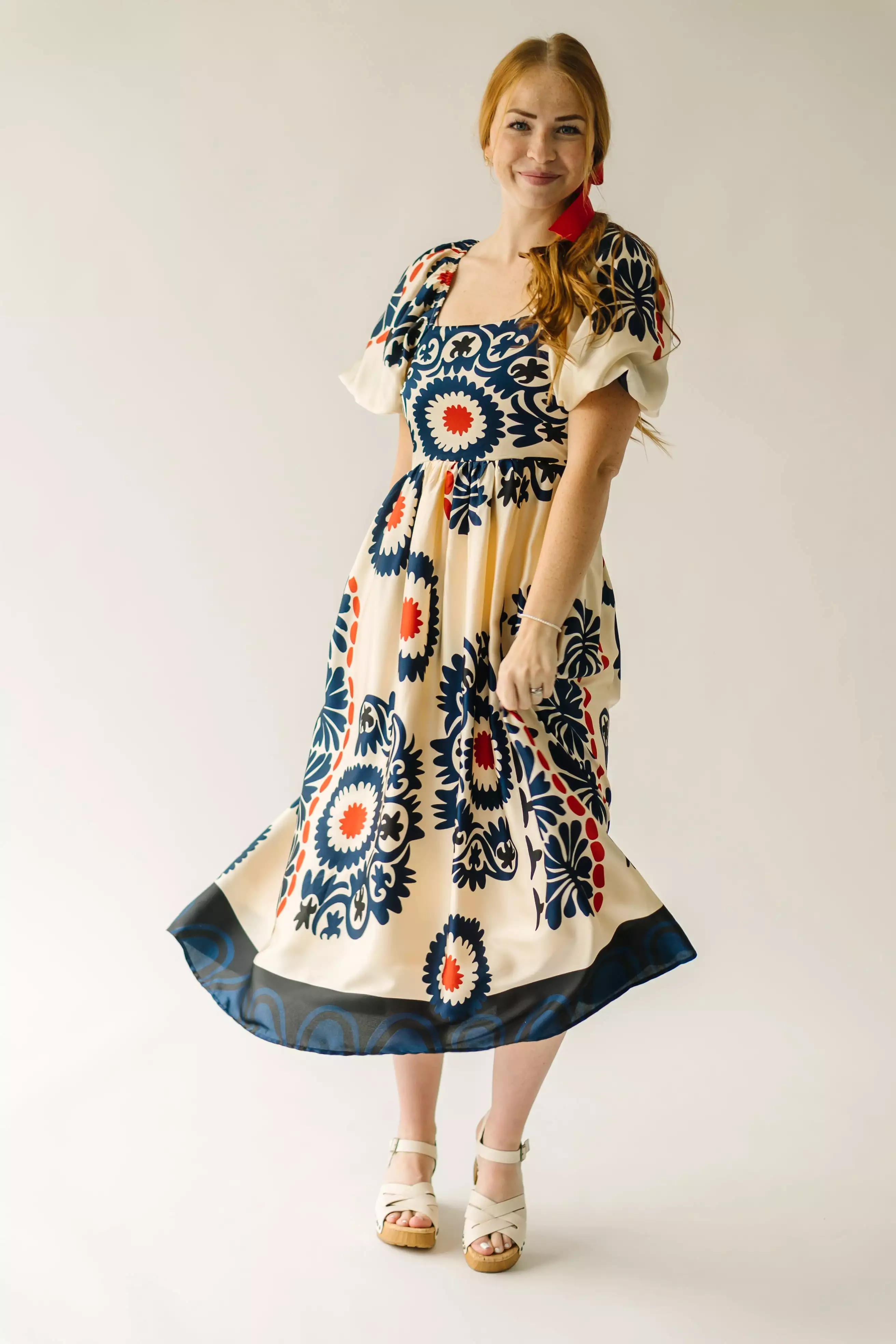 The Armada Puff Sleeve Satin Midi Dress in Navy Multi